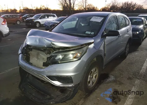 2015 Honda Cr-V Lx z USA, uszkodzony, nr VIN 2HKRM4H37FH696580